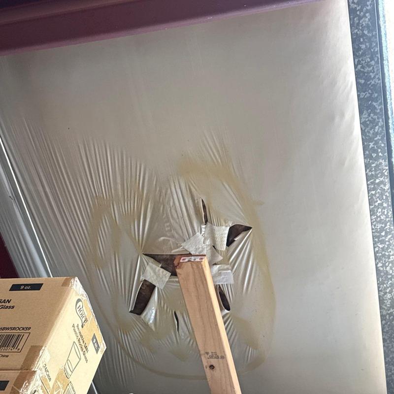 Ceiling vapor barrier puncture with water damage