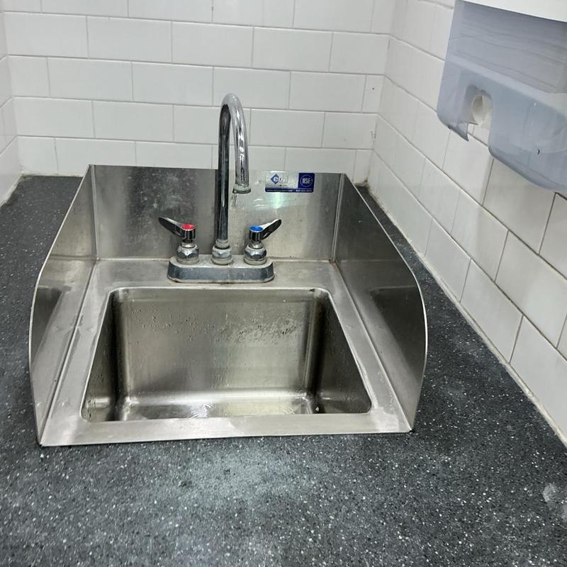 Stainless steel sink with faucet in restroom counter Stainless steel sink with faucet in restroom counter