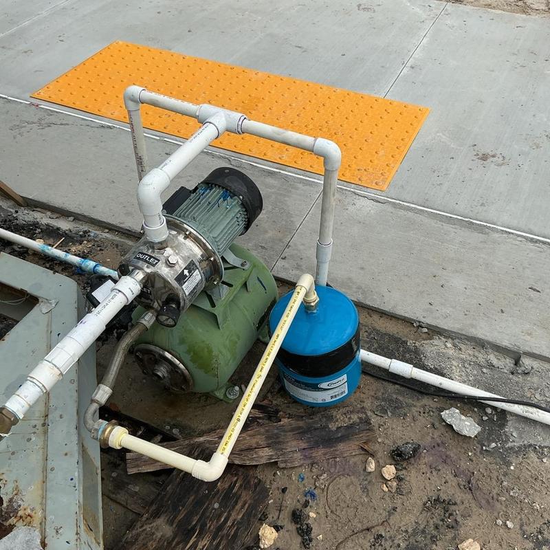 Well pump with blue expansion tank installation Well pump with blue expansion tank installation