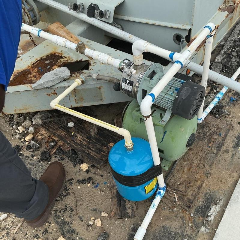 Expansion tank installation on well pump system outdoors Expansion tank installation on well pump system outdoors