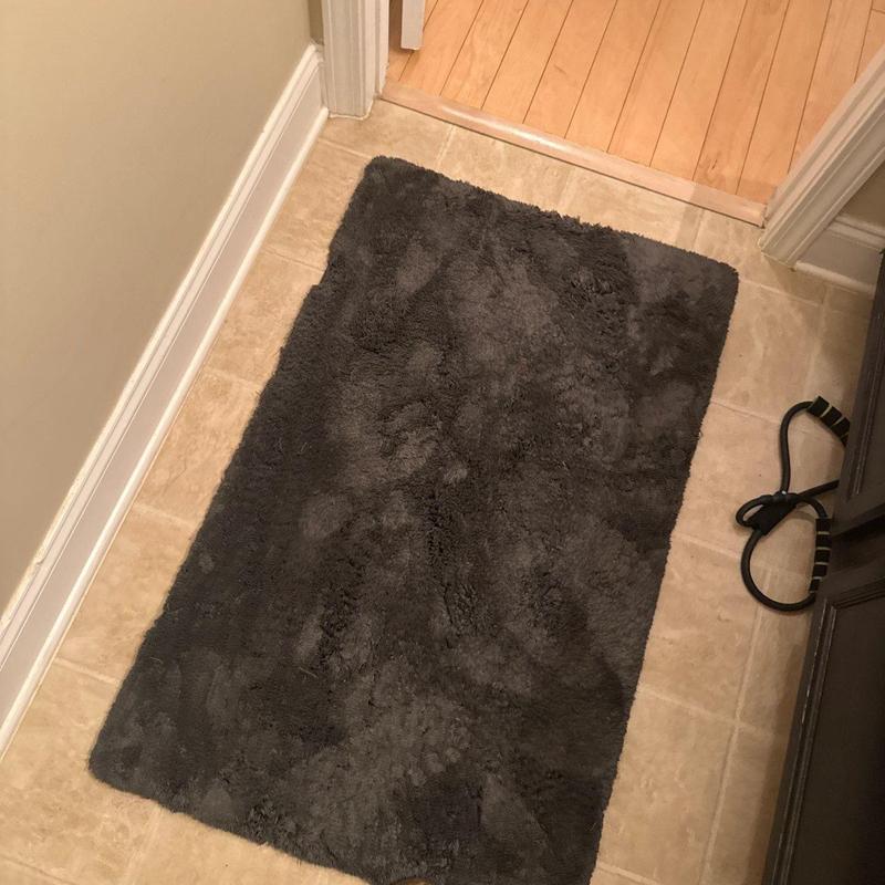 Bathroom floor tile and baseboard trim installation