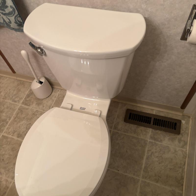 ADA height toilet installation and operability check