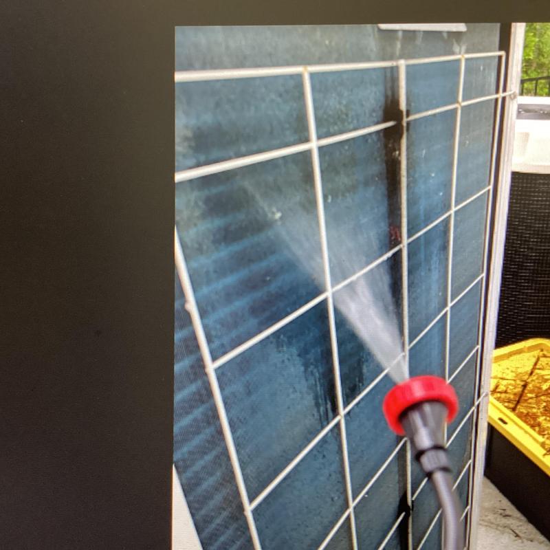 Air conditioner coil cleaning with water spray Air conditioner coil cleaning with water spray
