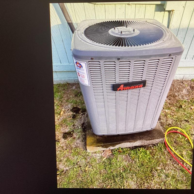 A/C condenser unit with coil cleaning and filter change A/C condenser unit with coil cleaning and filter change