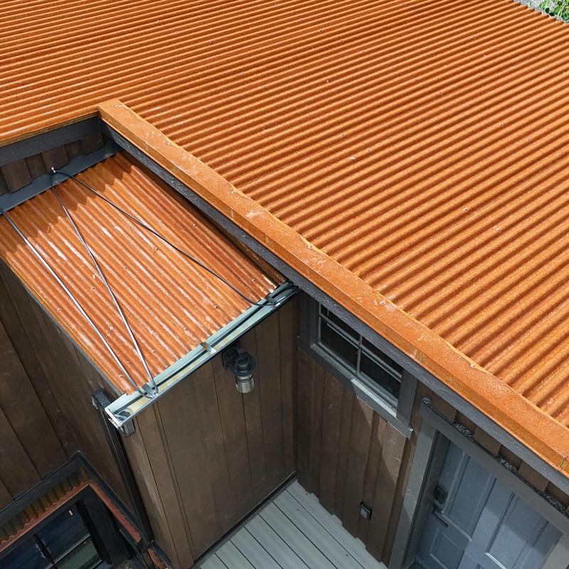Corrugated metal roof with heat tape installed