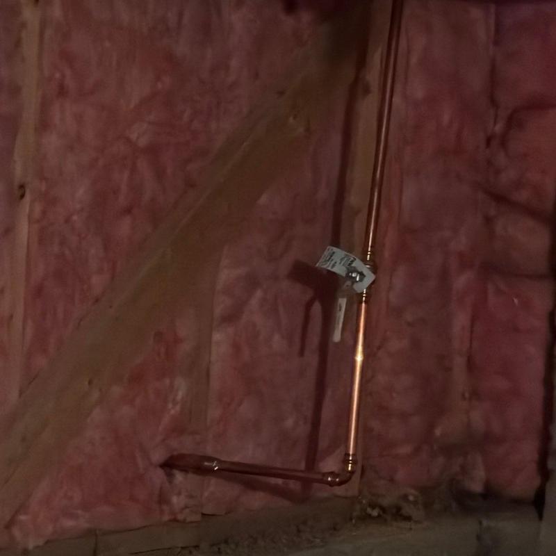 Copper piping with isolation valve in insulated wall cavity Copper piping with isolation valve in insulated wall cavity
