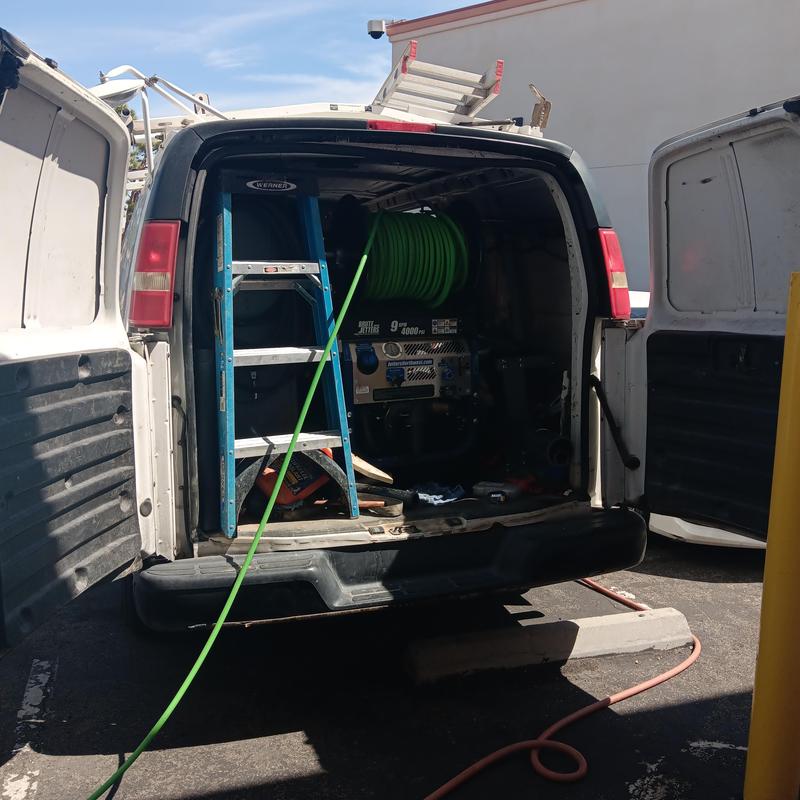 Sewer line hydrojet machine in plumbing van Sewer line hydrojet machine in plumbing van