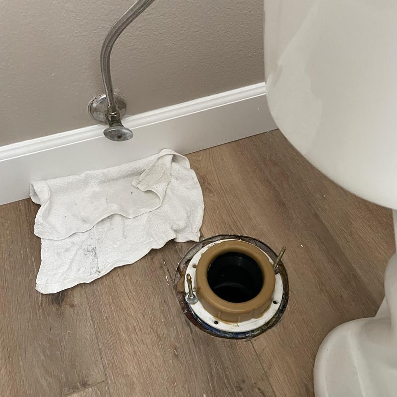 Toilet flange with new wax seal and mounting bolts