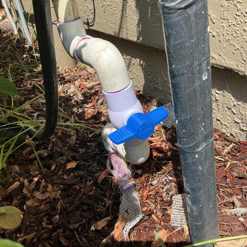 Isolation valve with blue handle on outdoor pipe Isolation valve with blue handle on outdoor pipe