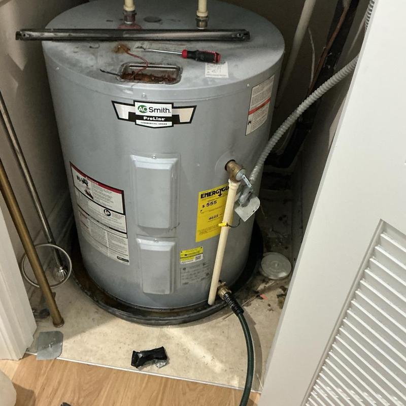 Water heater replacement with insulation and pan installed Water heater replacement with insulation and pan installed