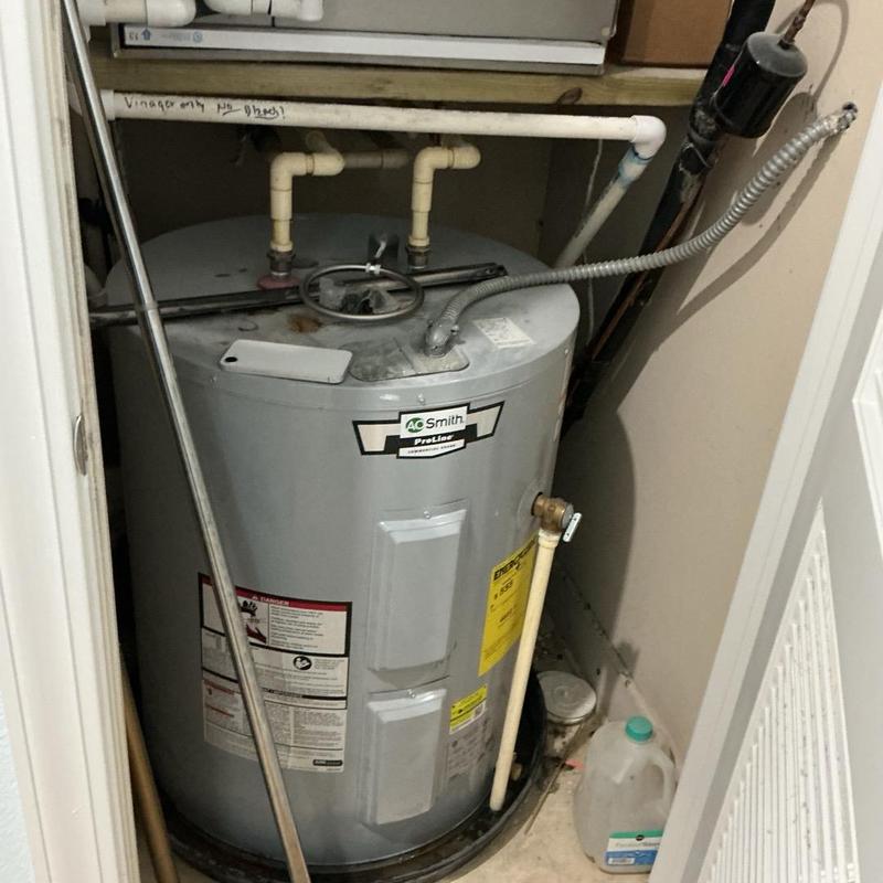 Water heater with new insulation and pan installed Water heater with new insulation and pan installed