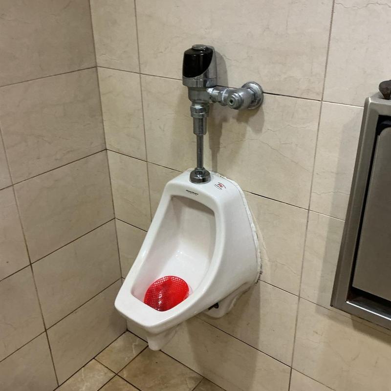 Flushometer valve on urinal with new shut off valve Flushometer valve on urinal with new shut off valve