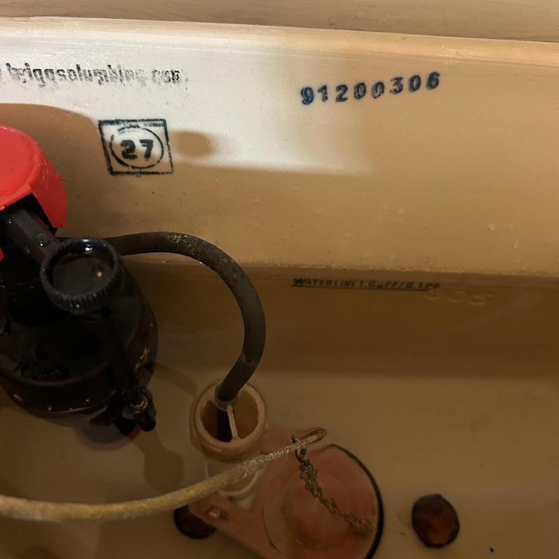 Toilet tank fill valve and flapper assembly inside