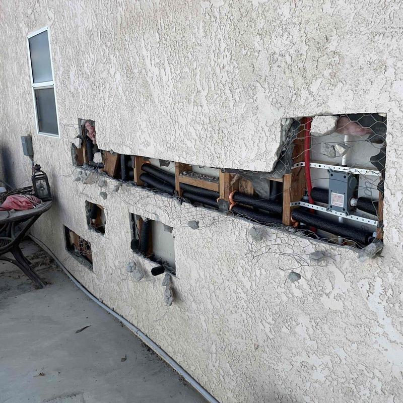 PEX water piping replacement inside exterior wall cavity