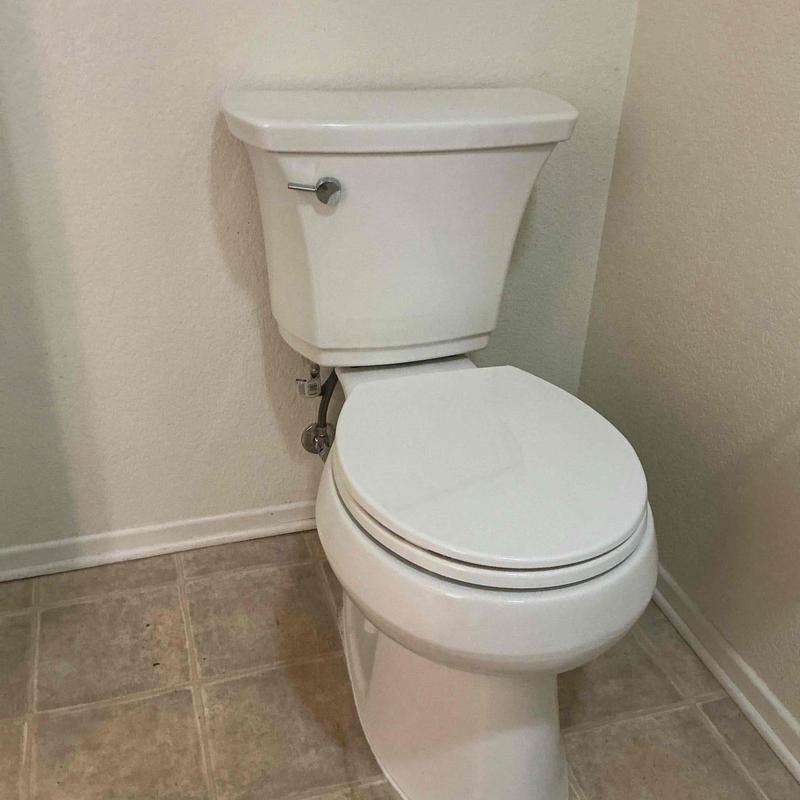 Kohler toilet installed on tiled bathroom floor