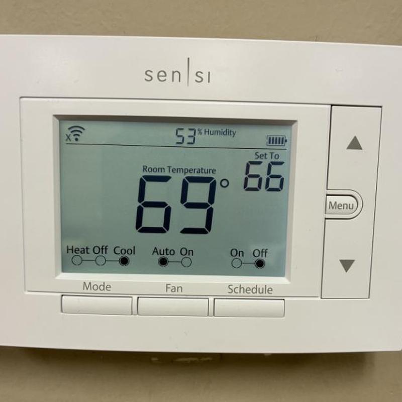 Sensi thermostat display showing temperature and settings Sensi thermostat display showing temperature and settings