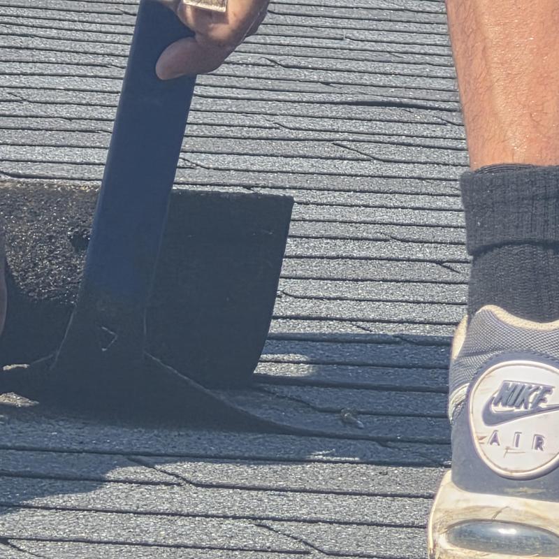 3-tab shingle nail pop sealing on roof surface 3-tab shingle nail pop sealing on roof surface