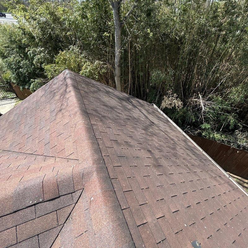 Asphalt shingle roof with minor hail damage inspection