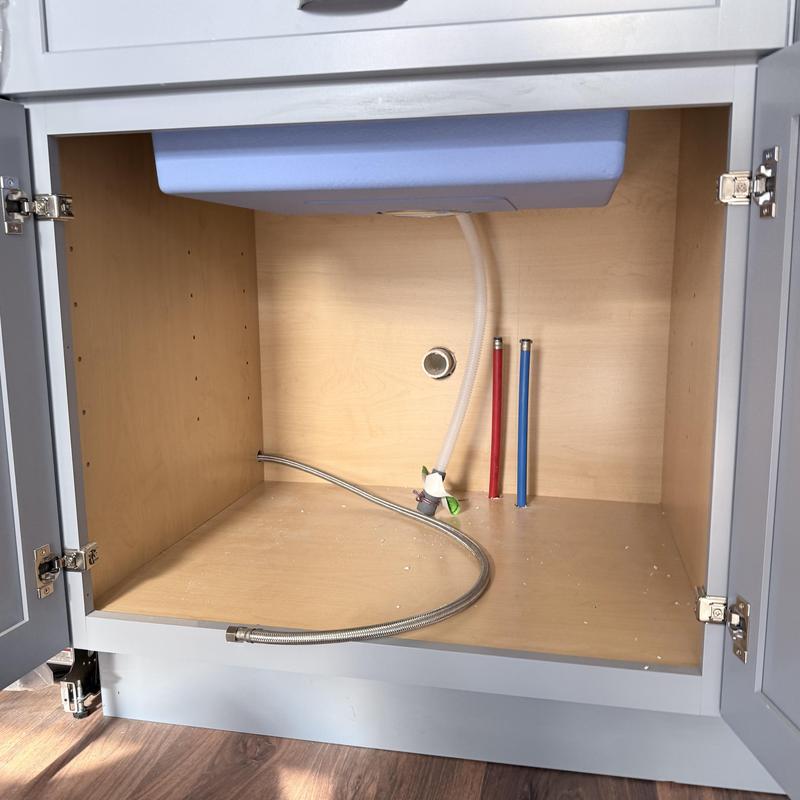 Kitchen plumbing drains and emergency stops installation