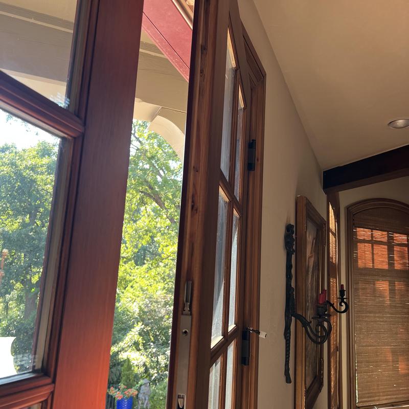Multipoint lock on wooden door with window panels Multipoint lock on wooden door with window panels