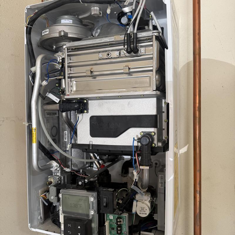 Tankless water heater heat exchanger and components