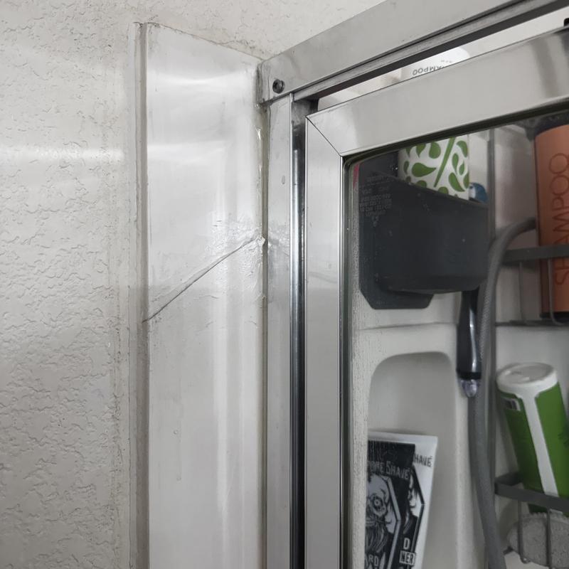 Shower enclosure cracked panel near door frame Shower enclosure cracked panel near door frame