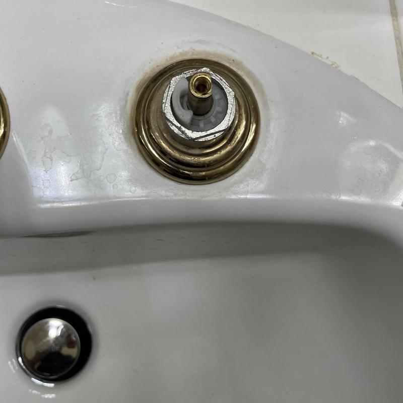 Bathroom faucet cartridge stem in sink basin
