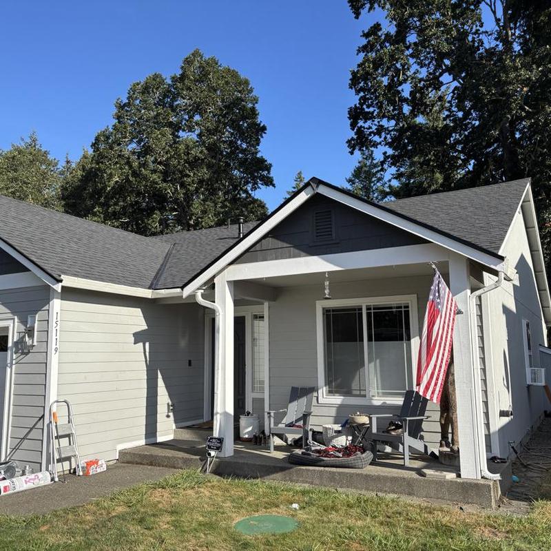 Roof gutter system on residential house exterior