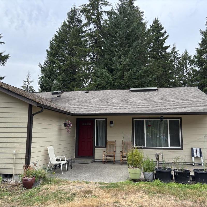 Asphalt shingle roof with skylights cleaning in Hayden, ID
