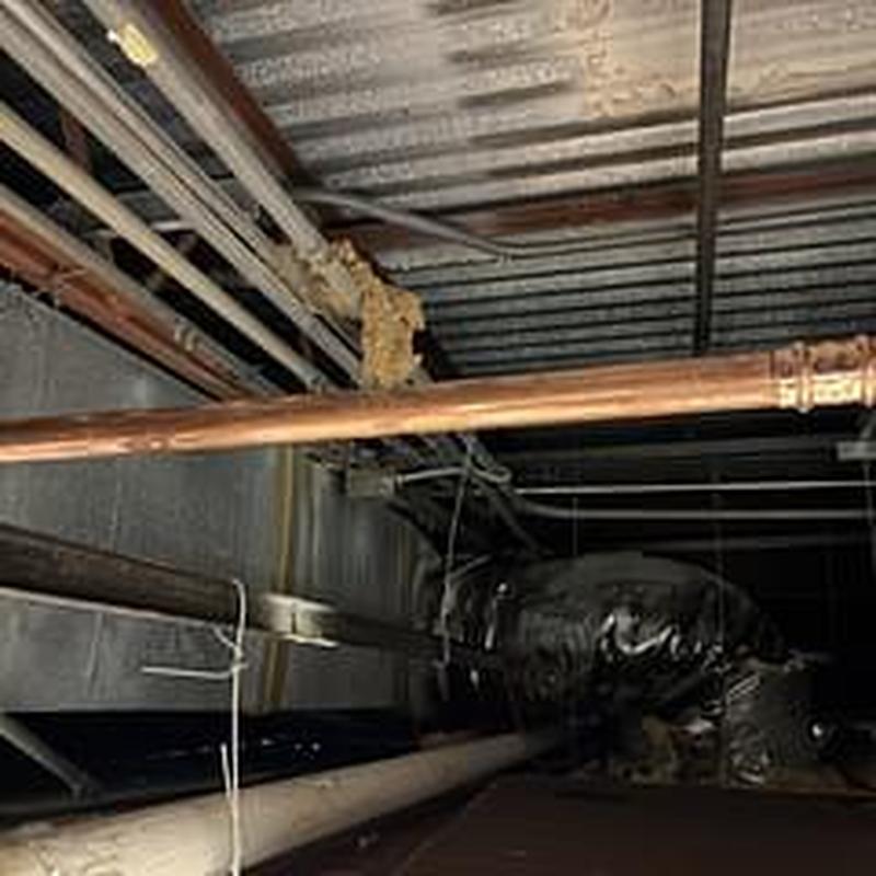 Copper hot water line with press-fit coupling repair Copper hot water line with press-fit coupling repair