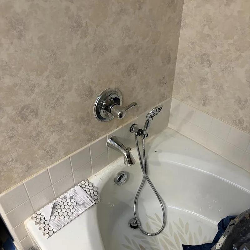 Bathtub faucet and handheld shower installation