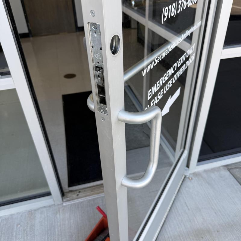 Exit device lock mechanism on commercial glass door Exit device lock mechanism on commercial glass door