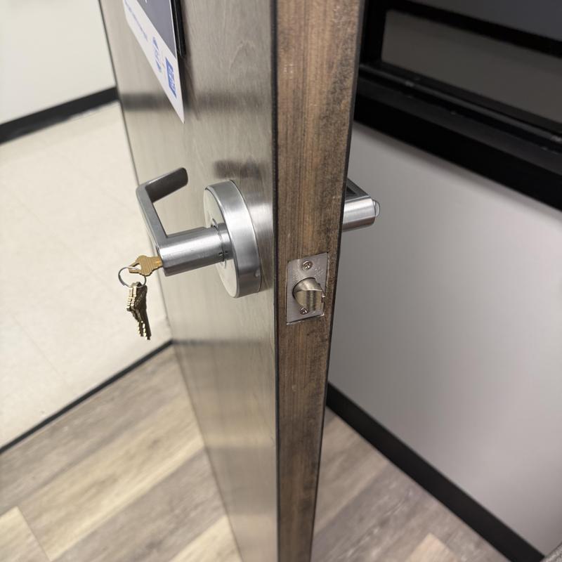 Door lock with new keys in commercial office door Door lock with new keys in commercial office door