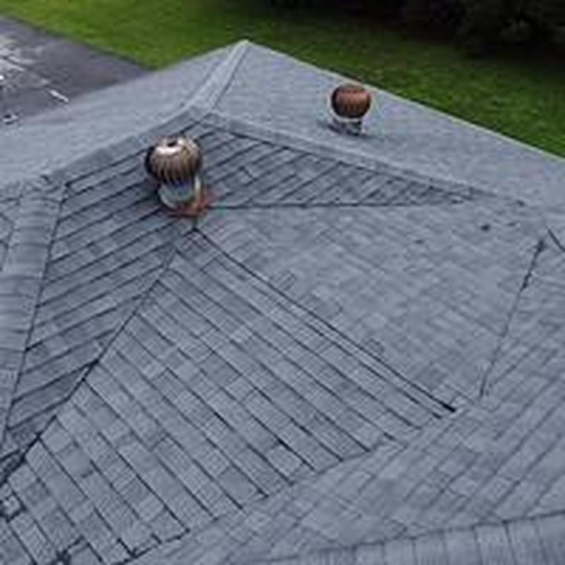 Asphalt shingle roof with repaired vent flashing Asphalt shingle roof with repaired vent flashing