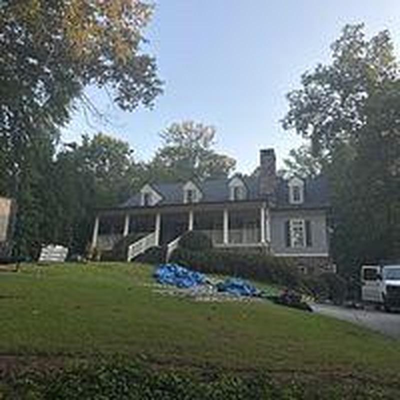 Asphalt shingle roof replacement on residential house Asphalt shingle roof replacement on residential house