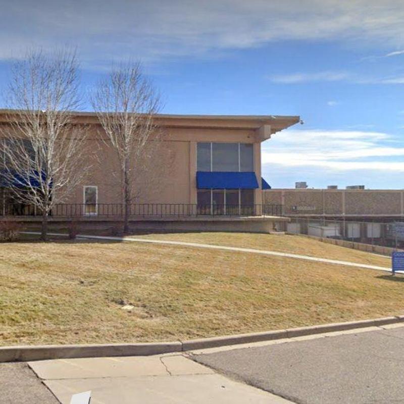 T.P.O. flat roof with blue awnings at Goodwill facility