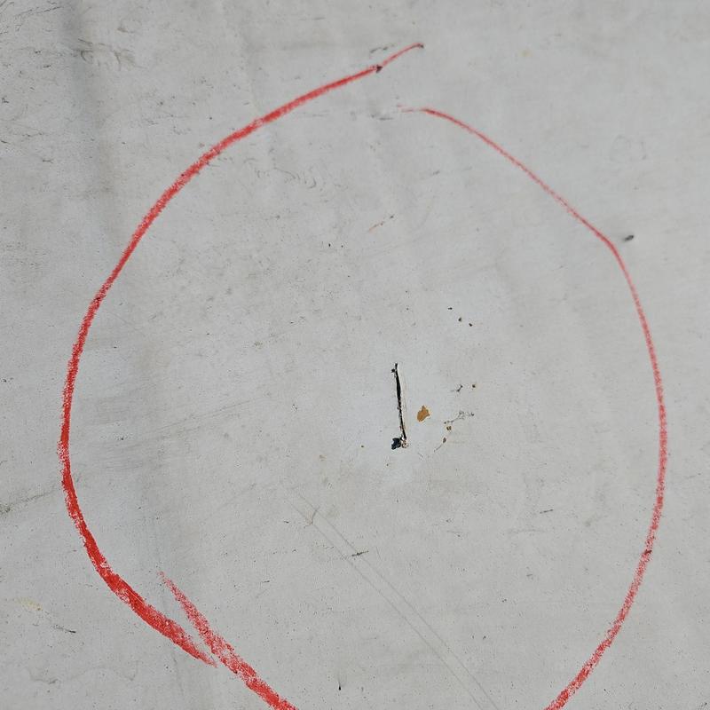 TPO flat roof puncture marked in red circle