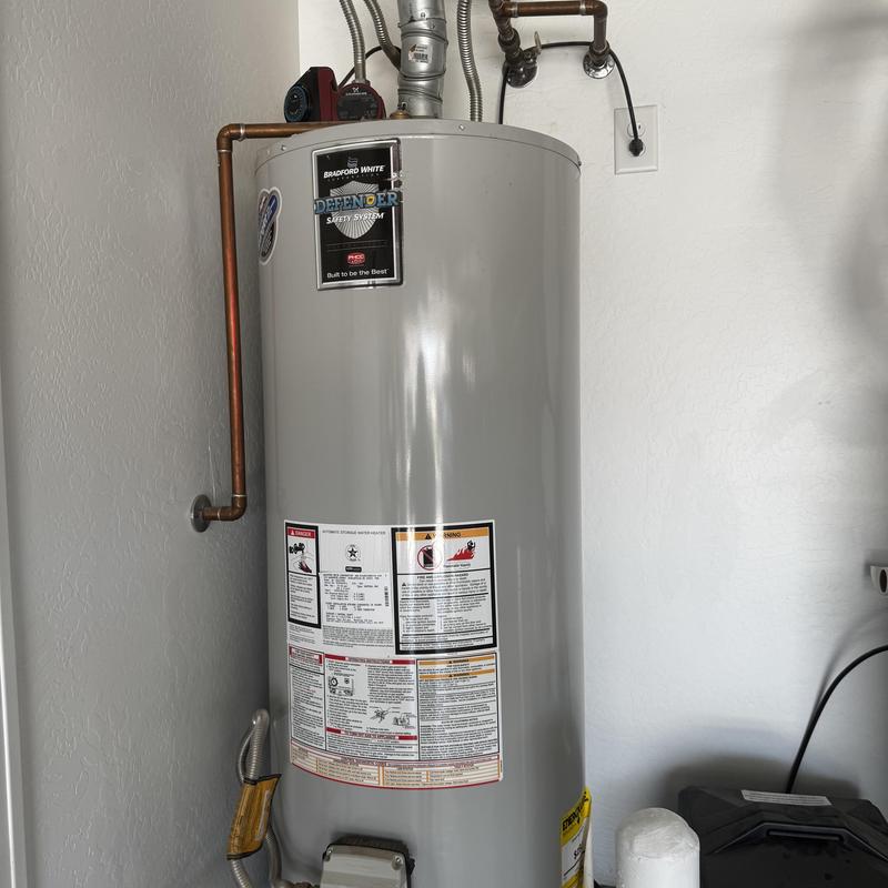 Water heater installation with new anode rod