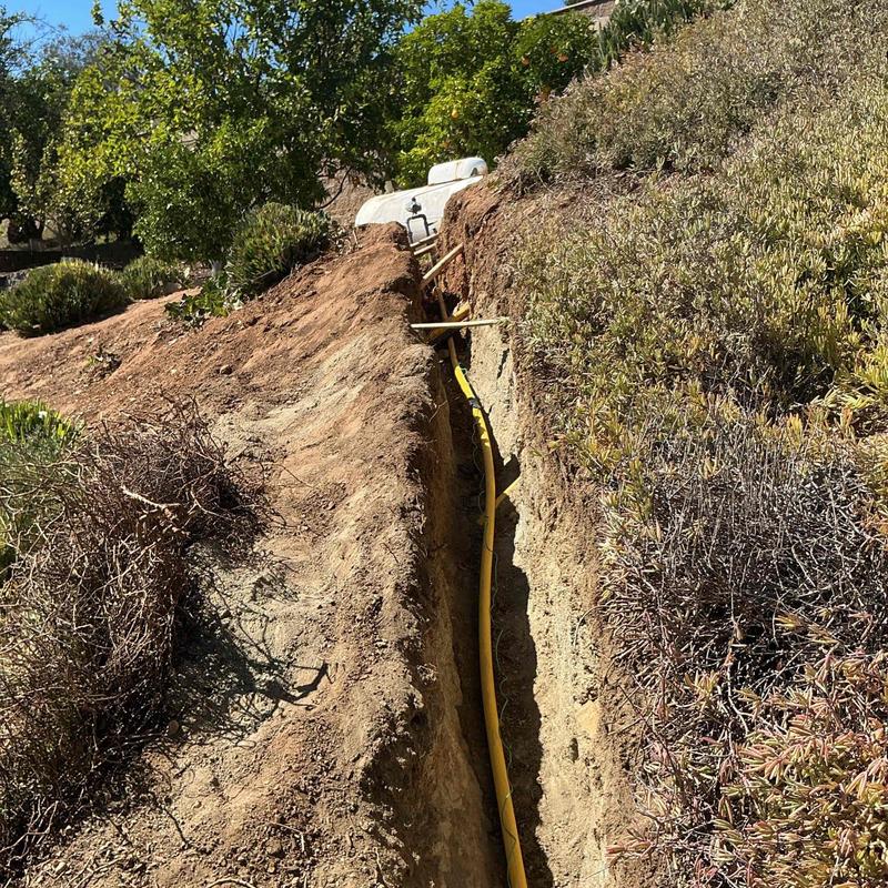 Poly gas pipe installation in dug trench