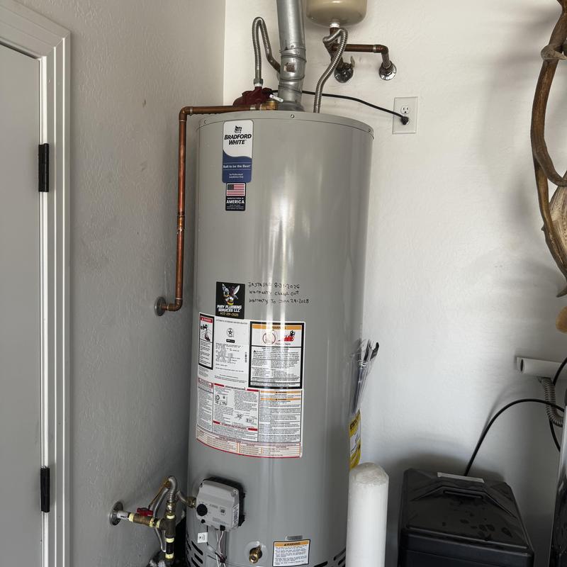 Water heater tank replacement with connected pipes