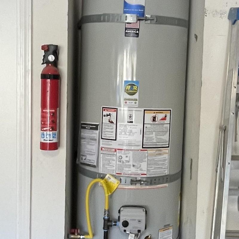 50-gallon Bradford White water heater installed in garage