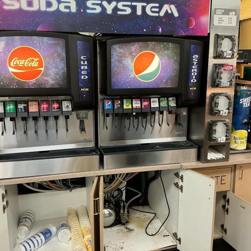 Soda machine drain hose and wet area cleanup