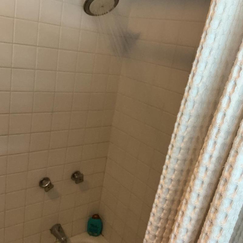 Shower and tub drain cleaning with water running