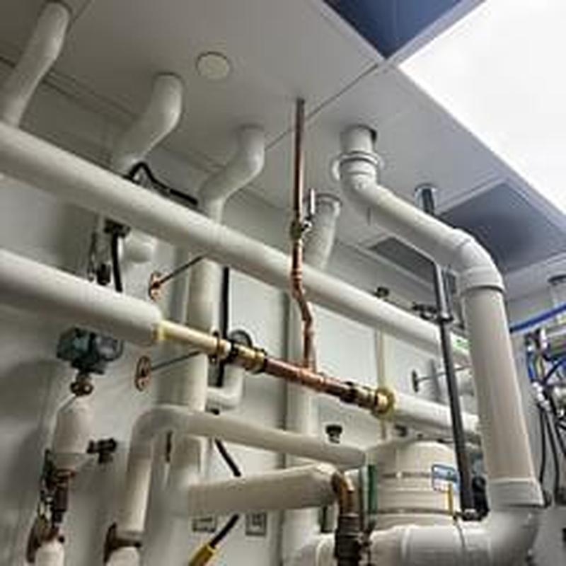 Filtered water line plumbing with copper and PVC pipes Filtered water line plumbing with copper and PVC pipes
