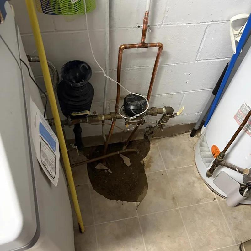 Copper water pipe leak with exposed concrete floor