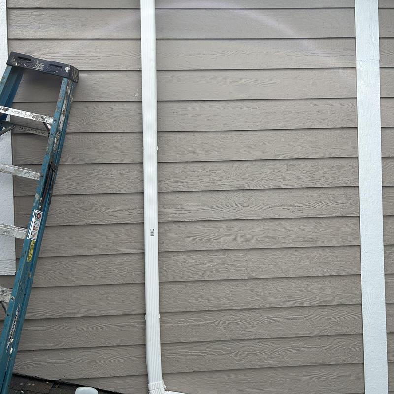 Line set covers installation on home exterior wall Line set covers installation on home exterior wall