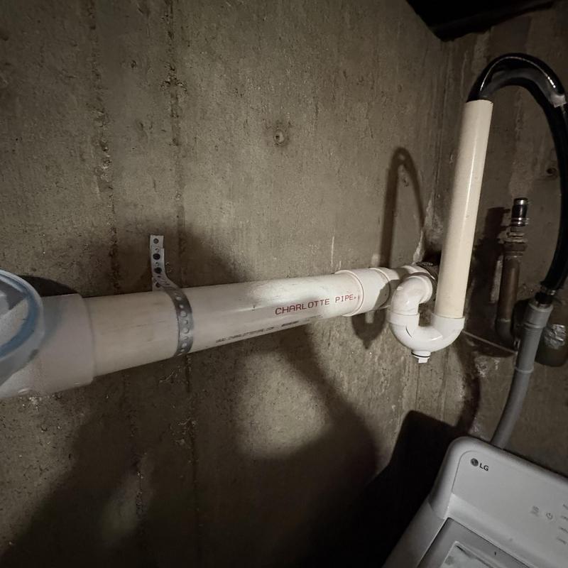 3-inch PVC drain pipe with trap installation