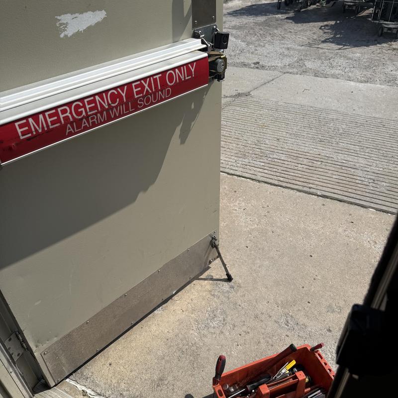 Von Duprin exit device with alarm and strike repair Von Duprin exit device with alarm and strike repair