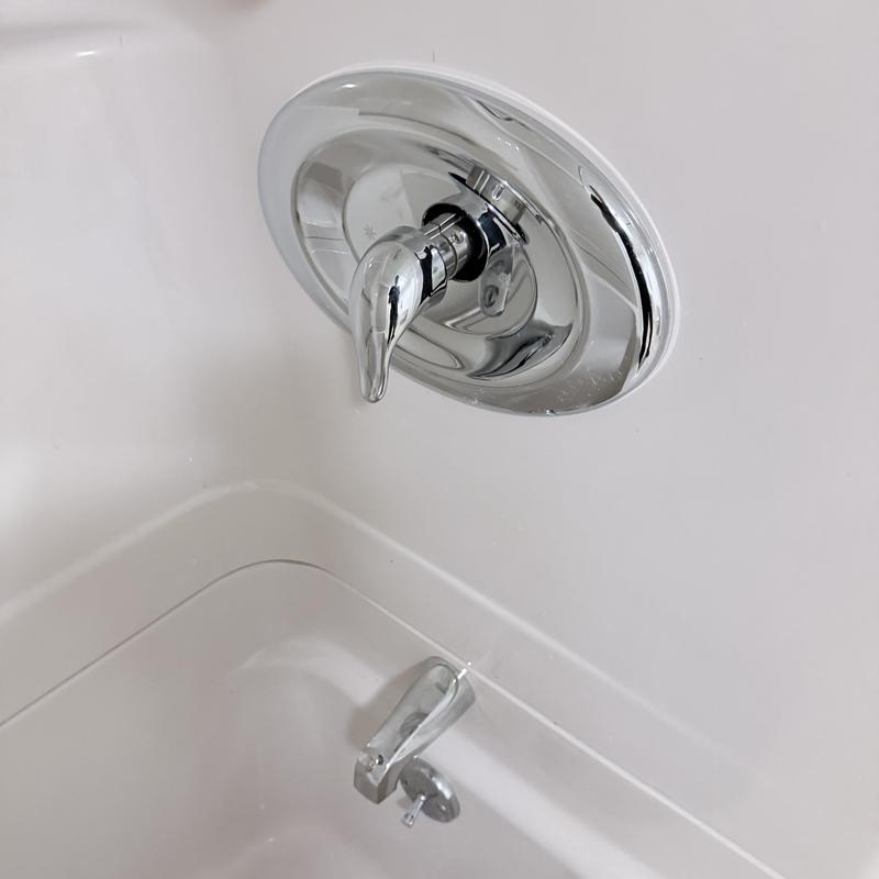 Shower valve and bathtub spout installation in bathroom
