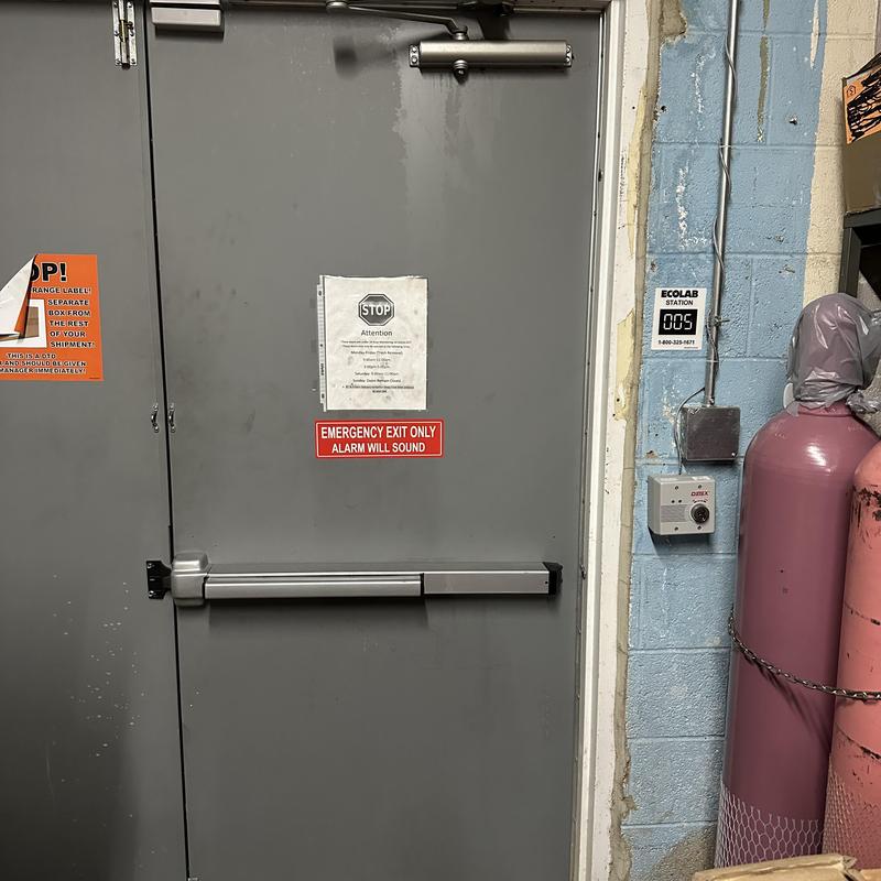 Detex exit alarm and panic bar on emergency door Detex exit alarm and panic bar on emergency door
